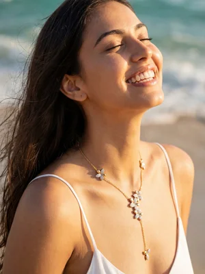Pendant on a fine white-metal chain, beach portrait