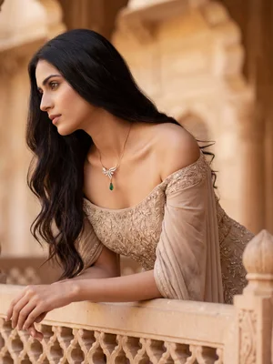 Pendant on a model on a carved balcony
