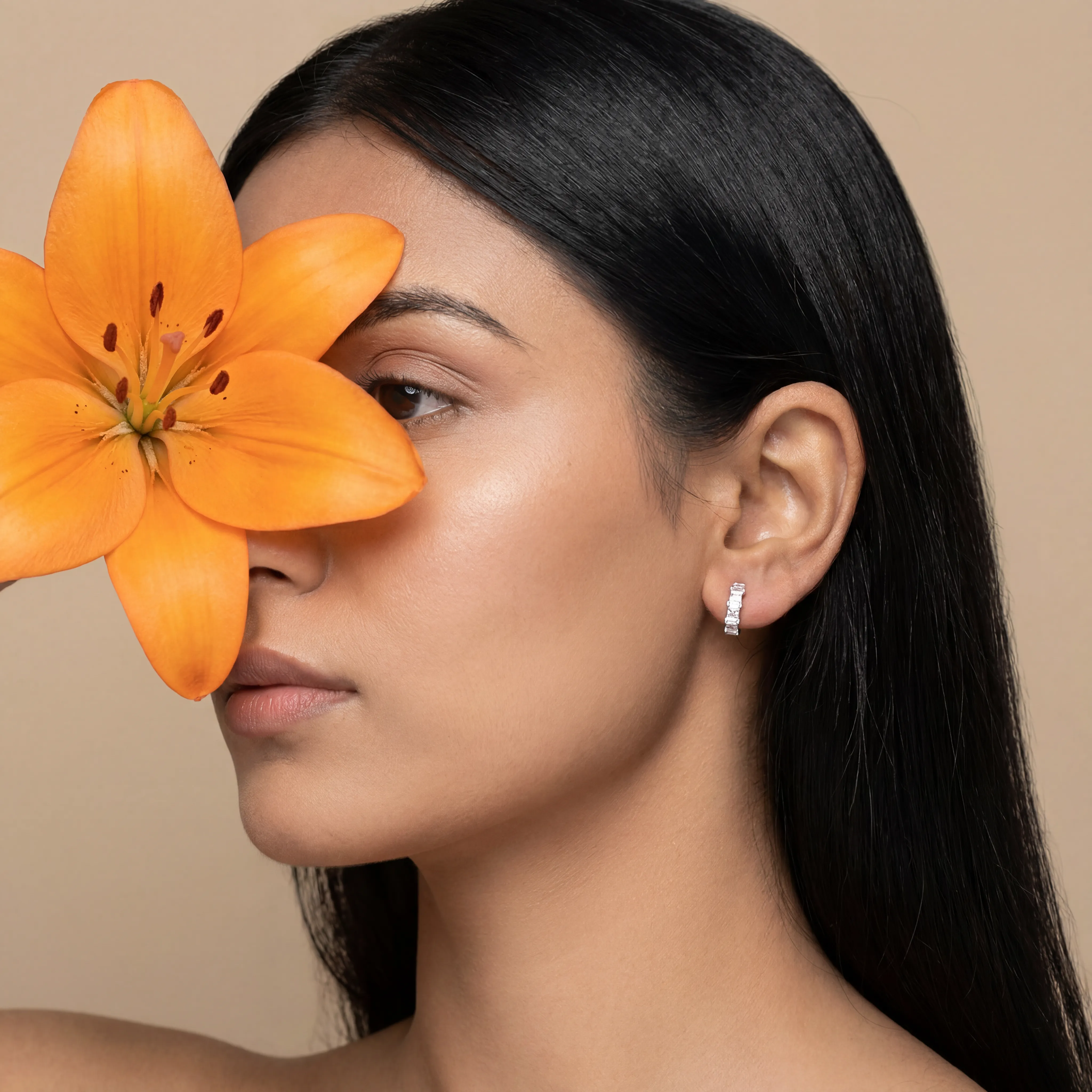 AI lifestyle model wearing Ghare square-cut studs