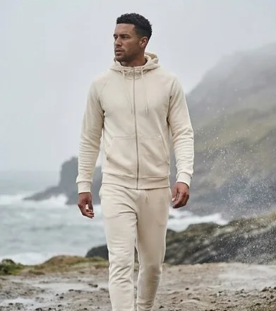 Activewear look on a model on a misty rocky coastline, an AI photoshoot by Kaptured.AI