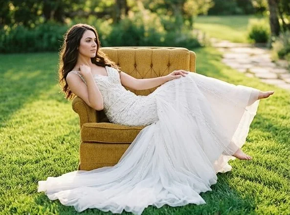 The same bridal look in a second armchair pose, shot with AI