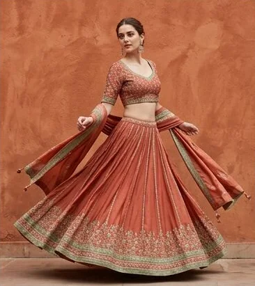 Ethnic wear look on a model moving past a terracotta wall, an AI photoshoot by Kaptured.AI