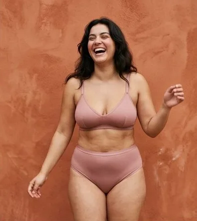 Lingerie look on a model moving past a terracotta wall, an AI photoshoot by Kaptured.AI