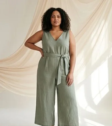 Plus-size look on a model against a draped linen backdrop, an AI photoshoot by Kaptured.AI