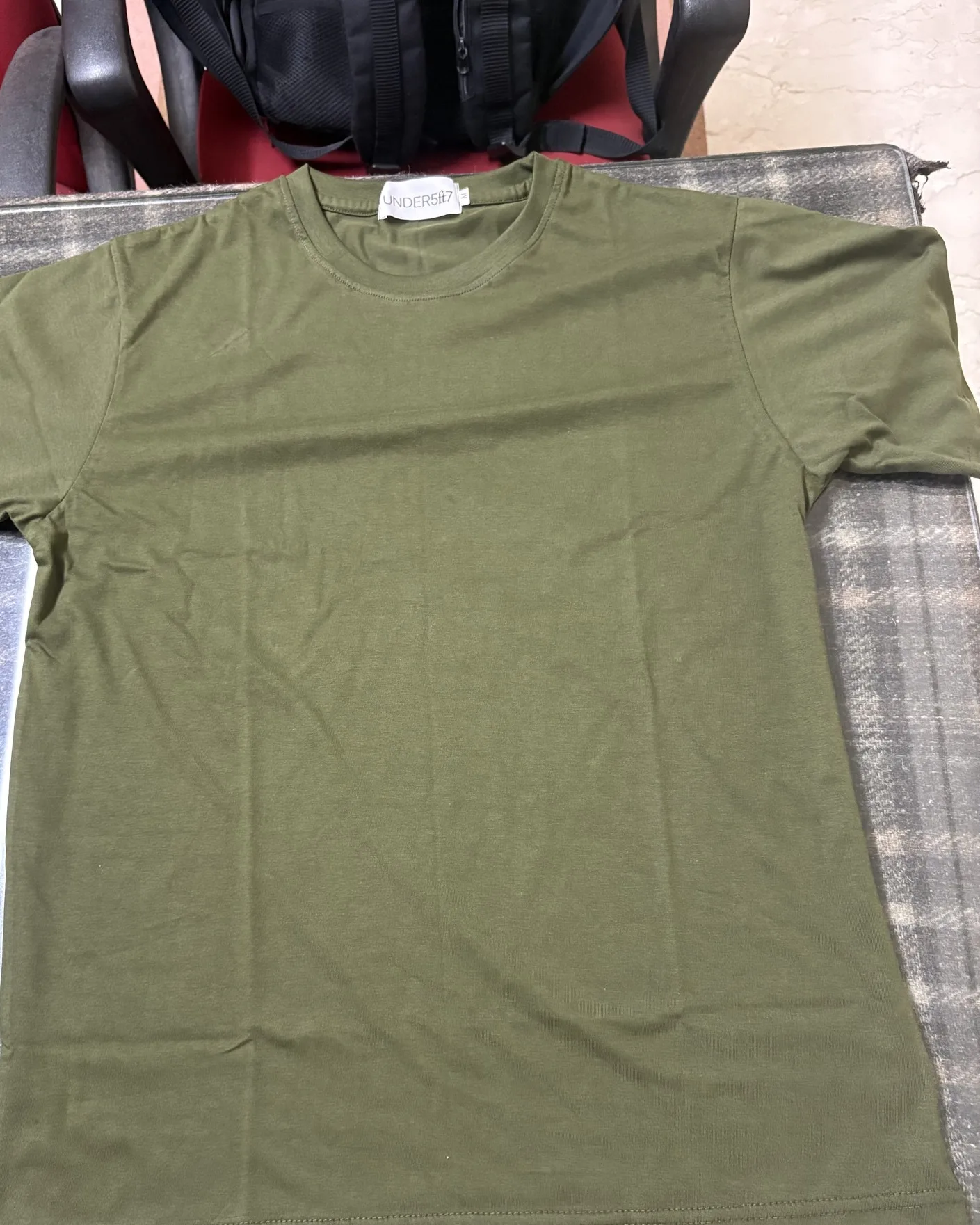 menswear product photo as sent, before the ghost mannequin