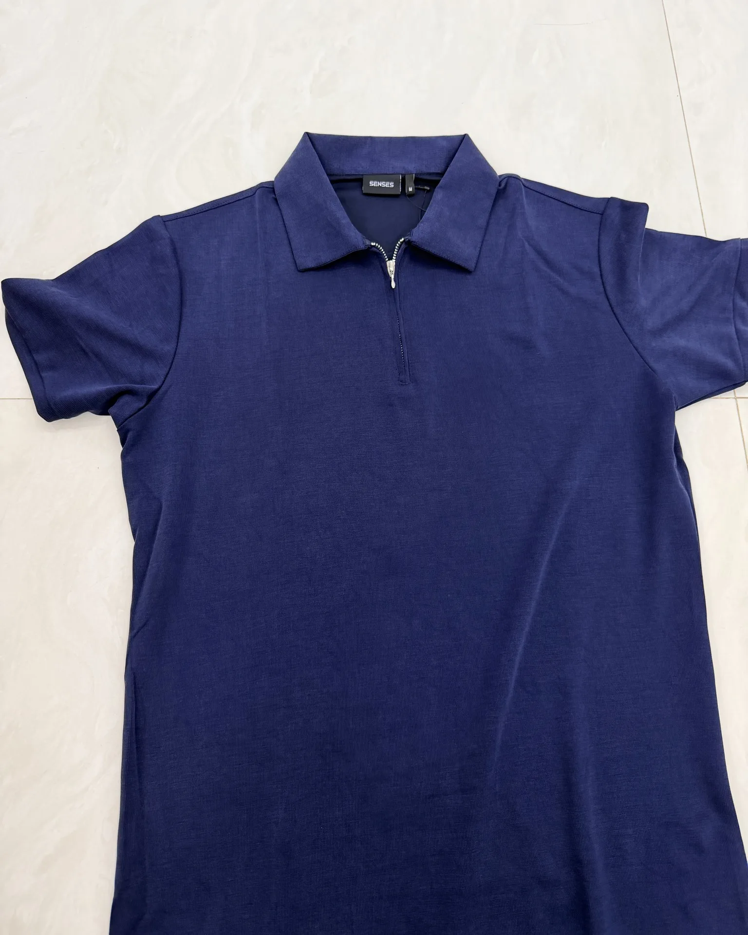 menswear product photo as sent by the brand, before the lifestyle shots